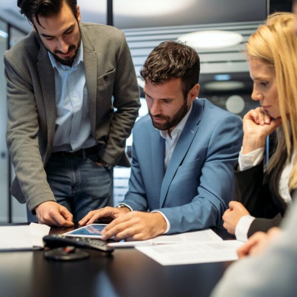 picture-of-business-people-discussing-in-office.jpg